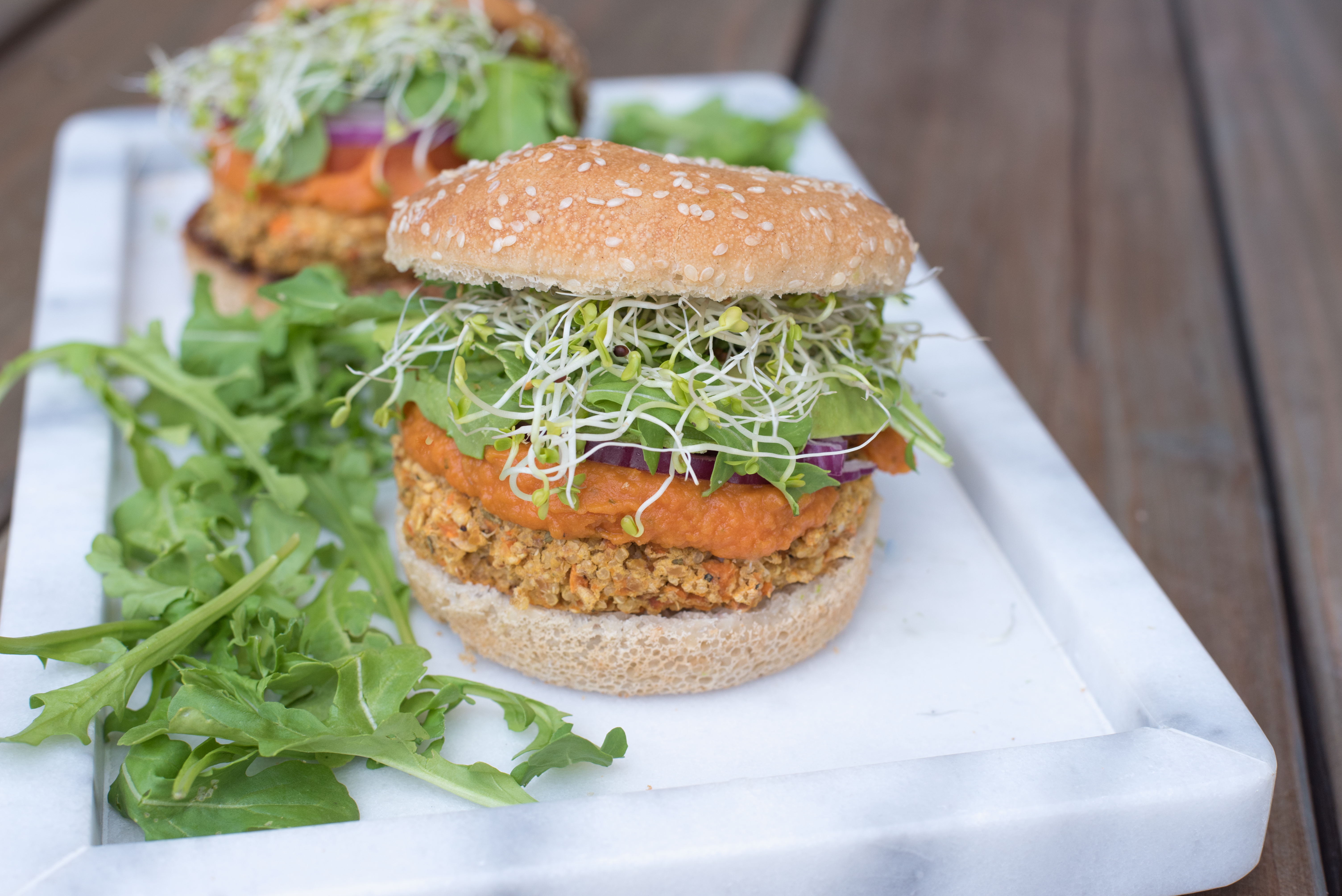 Mediterranean Rosemary Veggie Burgers Topped with Roasted Veggie Spread 